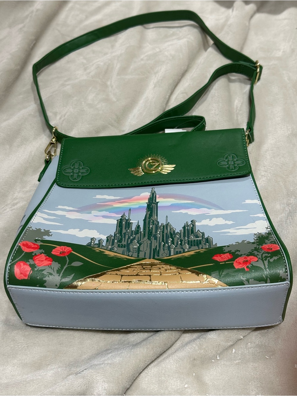 Green Illustrated Crossbody Bag with Gold Emblem